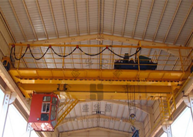 How often should the brakes of overhead cranes be checked?