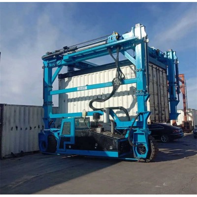 The Straddle Carrier equipped with an auto spreader for handling 45 ton