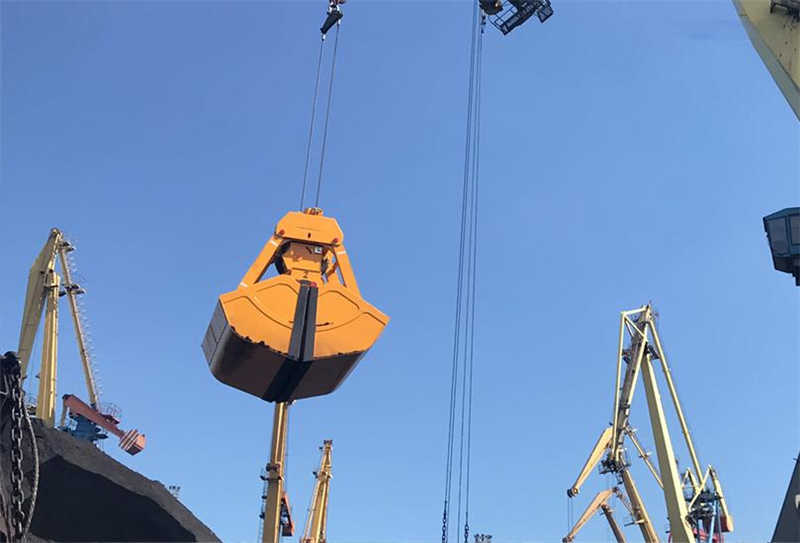 Robust Remote Control Clamshell Grab for Harsh Mining Environments