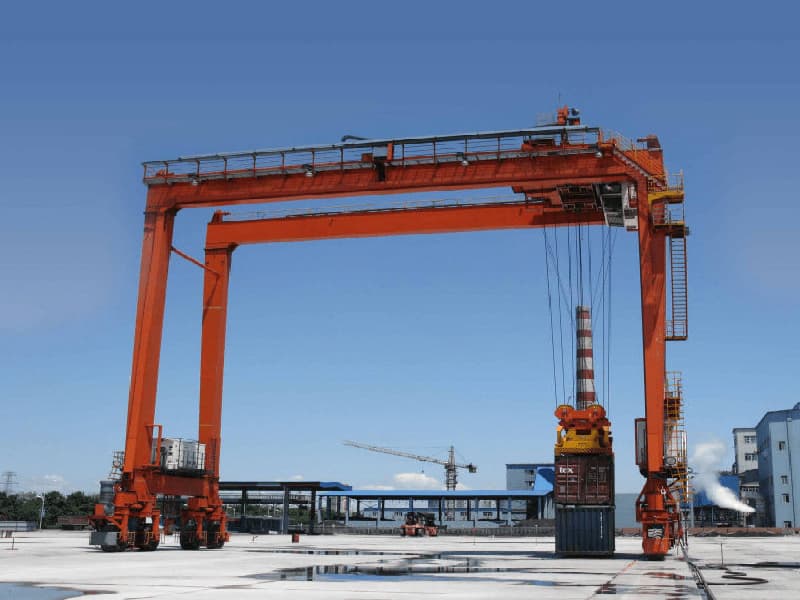 Driver-Centric RTG Crane with Under-Trolley Cab & Rack-Type Travel