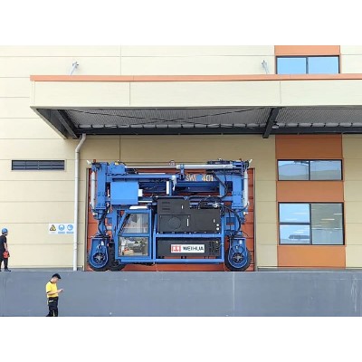 Reliable Straddle Carrier with Dual Emergency Systems for Fail-Safe Operation